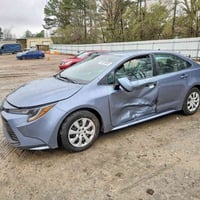 كورولا LE • ٢٠٢٤ • مزاد الرمادي