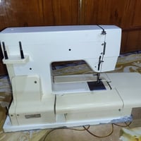 مكينه خياطه • عاطلة • بصره