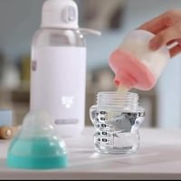 سخان رضاعة محمول • تحكم حرارة ٣٧-٧٠° • سعة ٢٧٠مل