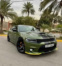 قطعه نادره بلون مميز زيتوني وفتحة سقف  جارجر(  Rt ) مكينه( ٥٧٠٠) رقم ب...