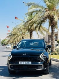 كيا سبورتج  2023 امريكي هايبرد   فول عدا الفتحه كير مكينه تبريد حداديه...