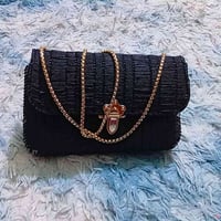 شنطة يد • خياطة يدوية • حسب الطلب