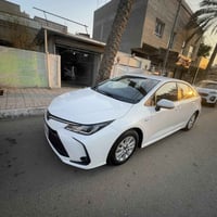 كورلا هايبرد مديل ٢٥ ماشيه ٣٠  رقم بغداد  السيارة مكفولة كفالة عامة ال...