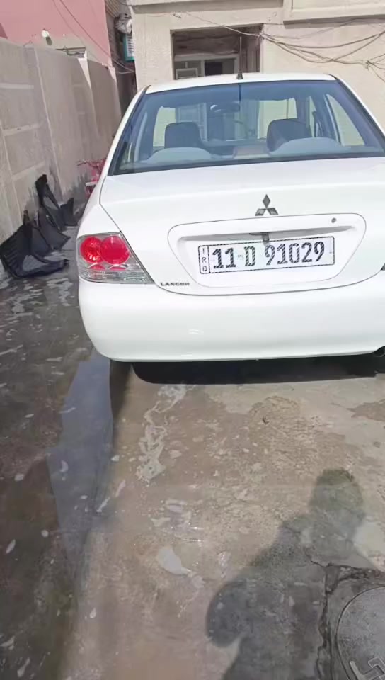 لانسر 2011 كير ومحرك مكفول ماشيه ١٣٩ السعر ٩٨ المكان  بغداد الشعب ***********
