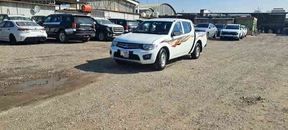 مسيوبيشي موديل 2015  L200 لبيع رقم بغداد جديد سياره جاهزه السعره 130 $ ***********
