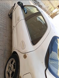 كيا كريدوس موديل 1995 رقم بغداد دولي بأسمي السياره جاهزه كير ومكينه خي...