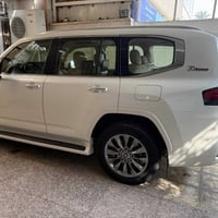 لاندكروز 2022 VX تنفس طبيعي مكفولة كفالة عامه ساز ماشيه 59 رقم بغداد ب...