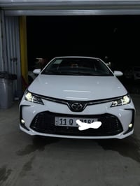 كورلا هايبرد 2025 (HEV) ماشيه ٤ الف  مكفوله كفاله عامه فول موصفات ماعد...