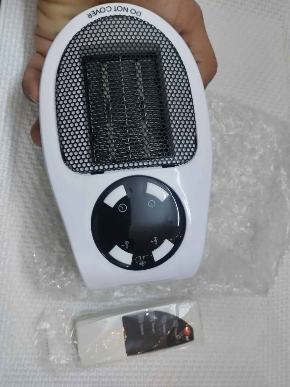 جهاز تدفئة مكتبي ريموت كنترول تحكم بالوقت والحرارة جديد غير مستخدم....الاتصال *********** بغداد, العراق
