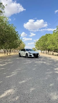 Nissan Altima SV 2025 . ماشية 22 الف مایل  . سيارة بس بنيد صبغ و بي شو...