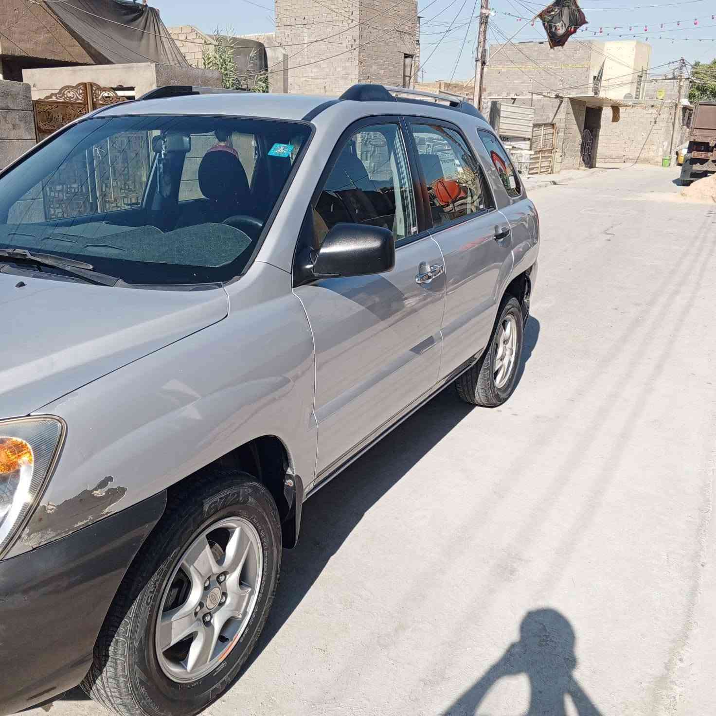 السلام عليكم سياره سبورتج 2006 سياره مال بيت جانيها 7سنوات محرك 2000دوش المرغوب مكفوله كير محرك شركه برغي ما مفتوح  عل ابلاد  تبريد ثلج حداديه صدر كهربائيات كلها شغاله رقم بغداد هزه سنويه بسمي شرط تحويل بيها جاملغ أيسر امامي وباب السايق رش صبغ وبنيد بارد علئ قد شبر فقط السعر 100 مكاني بغداد العبيدي وبيها مجال قليل حك الجية رقم الهاتف ***********
