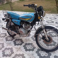 موتوسيكل • تا يكر • ٢٣