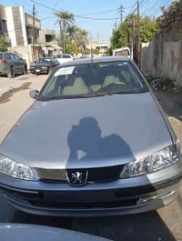 بيجو موديل 2001 مصبوغه حزام جماليه بيه ضربه بالجاملغات الخلفيه خفيفه ع...