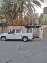 الضباط خلف مصرف الرشيد • ٢٠٠م • ٥نوم