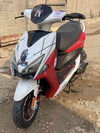 دراجه ماكس صيني عنوان بغداد حي بتول07733087081