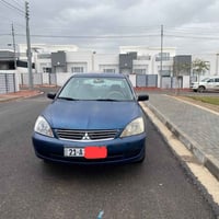 اخوان سياره لانسر موديل 2007  السياره بلاديه مابيها صبغ مكفوله كير ومح...