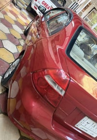 افيو خليجي  موديل 2008اوتوماتيك رقم بغداد داخل بيجي مكفوله من الضربه و...