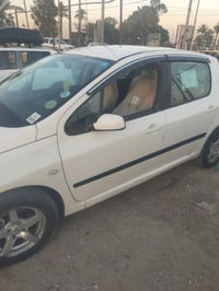 بيجو فرنسي موديل 2005كير ومكينة مكفولات 307سنوية ابسمي رقم بغداد السعر...