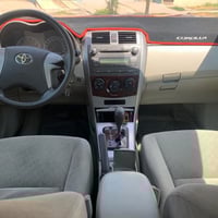 كورلا 2010 خليجي مكينة 1600 ضررها بابين  بيها صبغ مقدمة البوند وسقف مق...