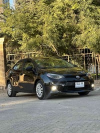 يالله ..   عندي. كورلا موديل 2014. وارد. امريكي. LE للبيع    رقم بغداد...