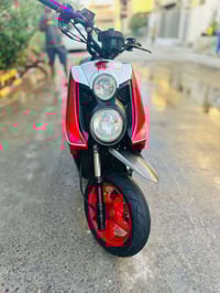 بغداد العبيدي • دراجة حمراء • كفالة عاملة