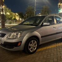 كيا ريو  2008 خليجي   مكينة 1600السيارة جاهزه بيها صبغ ٣ قطع ونص   تبر...