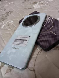 HONOR X9C 5G  ذاكرة 256 الداخليه 8+8 البطاريه 6600 معالج سناب دراغون 6...