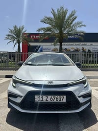 كورلا  2025  محرك 1800 هايبرد HEV رقم بغداد بسمي السيارة  ماشيه 18.000...