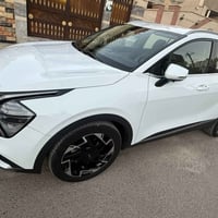 كيه سبورتج   موديل 2024  ماشيه 26  مال دوليه  السياره فول ماعدا البانو...