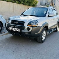 توسان 2009 رقم بغداد الجديد مكفولة من الصبغ والتبديل بيها بارد بسيط با...