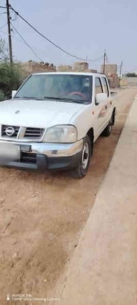 نيسان بيك اب دبل قماره 2012 رقم ميسان مشروع وطني تحويل  مكفوله من الكل...