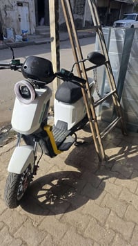 دراجة شحن • بطارية معطلة • كف تراب