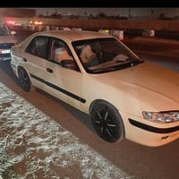 مازدا زووم 226  مديل 2001  رقم اربيل تكسي   كير عاديه   مكينه بانزين +...