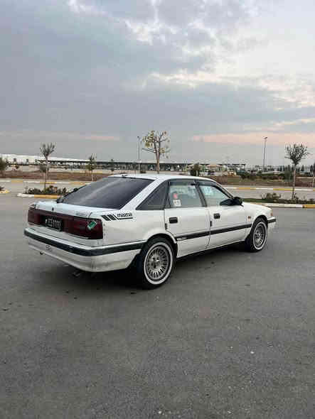 سه ره تا به ناوي خوا ي گه وره وميهره بان مازدا مؤديل ١٩٩٠ئارم پلاسيك سليماني. به شه رتي ئه وه ليات  مووسوو براوه به شه رته. گير ئؤ تؤ ماتيك  و وه مه كينه به خ. سلايدو جام كاره با. و قفل مه ركه زي  جوار تايه و ويلي خه ت سبي لؤكي له ژيره  پيشوو دواي كه بسه و ده عمي نيه    مالي فه قيره به س فرؤشتنه  شوين. سليماني. سعري ته نها. ٣٠كه لا ***********
*********** السليمانية
