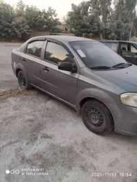 افيو موديل 2010 كير عادي محرك دبل كم شفت  لون فيراني رقم اربيل جديد بي...