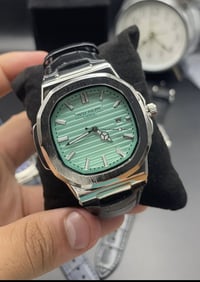 عرض على اول تم ١٢ الف فقط ساعه باتيك رجالي منفذ یومي بكوالتي جيد باتری...