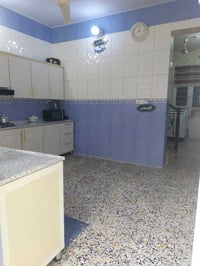 بيت للبيع ١٠٠متر طابقين الشعلة الدوانم شارع أفران الضياء 07711816318