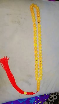 البيع سبحه كهرب بولوني حر شاهد استندر الوزن 30غرام عدد48خرزه ابيها نمش...