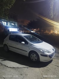 بيجو 307 موديل 2006 رقم بغداد الماني  محرك وكير صدر كهربائيات كله مكفو...