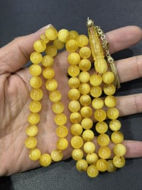 كهرب حر • كركوشة فضة • ٦٦حبة