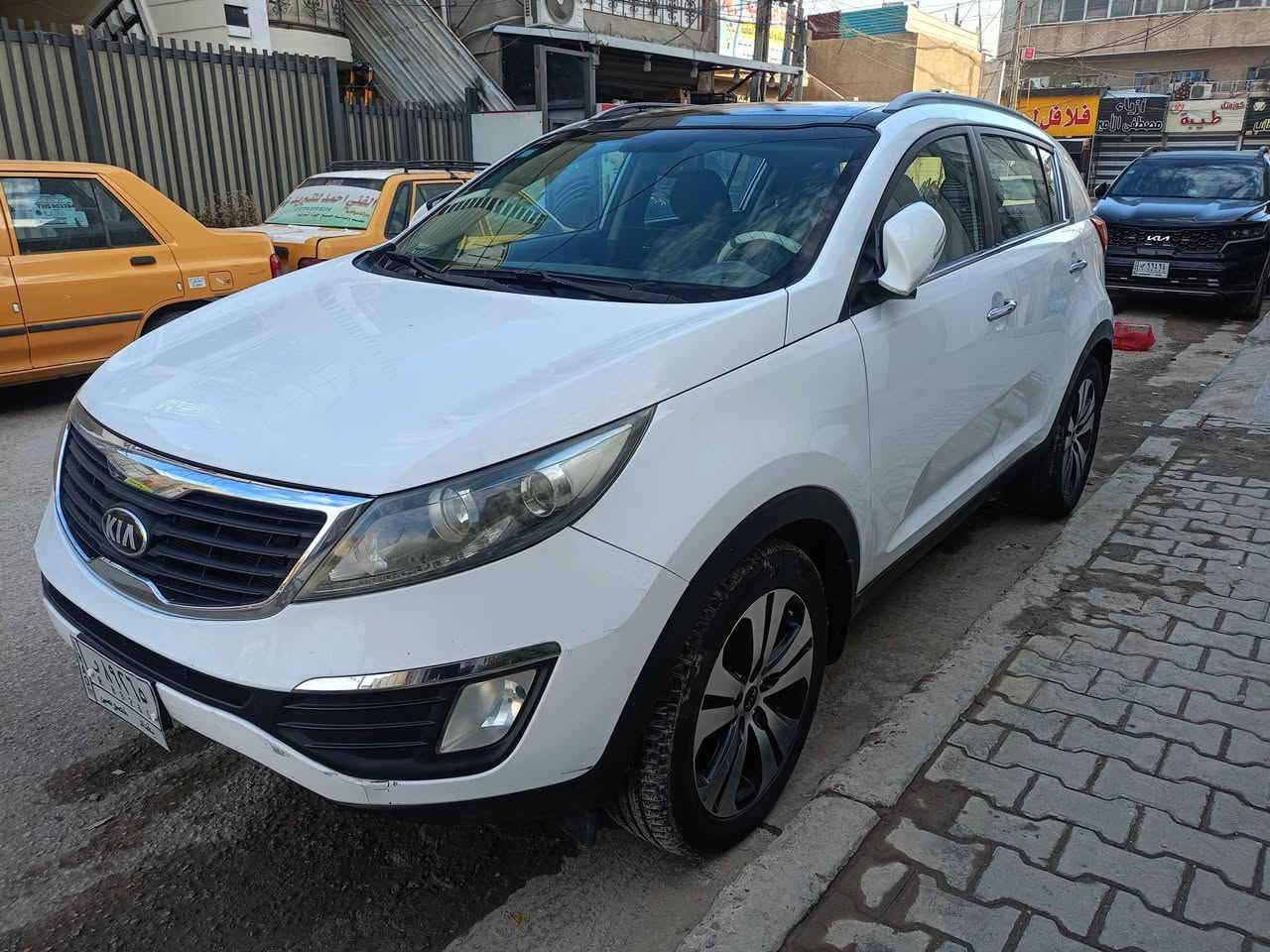 سبورتج 2014 خليجي السيارة مكفولة من الضربة والصبغ  محرك وكير وتبريد وصدر مكفول مابيها نقص السونار موجود السعر 153 اي استفسار الاتصال بالرقم *********** مكاني الدورة
