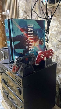 بلي 4 نضام 9 مع ثنين جويستك مع قاعدة شحن مهكر السعر 350 الف 0776707416...