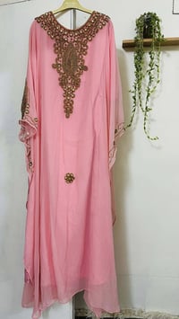 ملابس مستعملة • قطعة قطعة