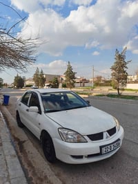 لانسەر مۆدێل 2007 مەکینە بچووک، بەشەرتی گێڕ و مەکینە  سێ پارچەی هەیە، ...