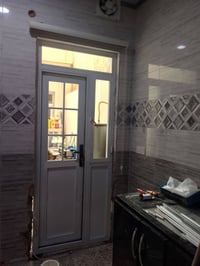 انا حداد باب وشباك متجول هذا باب مطبخ  وهذا رقمي ٠٧٧١٥٣٩٢٧١٦