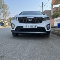 كيا سورنتو خليجي  رقم بغداد الماني بسمي  موديل ٢٠١٧ شكل ال١٨ لون ابيض ...