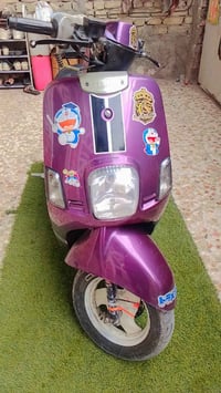 سلام وعليكم دراجه بوليس كابريتر.  لون بنفسجي. كفرات تاي وان  دراجه خير...