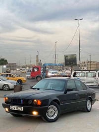 BMW موديل 1992 وارد يابان 525 اصل بليته مصبوغه عام اللون اسود ملكي  دي...