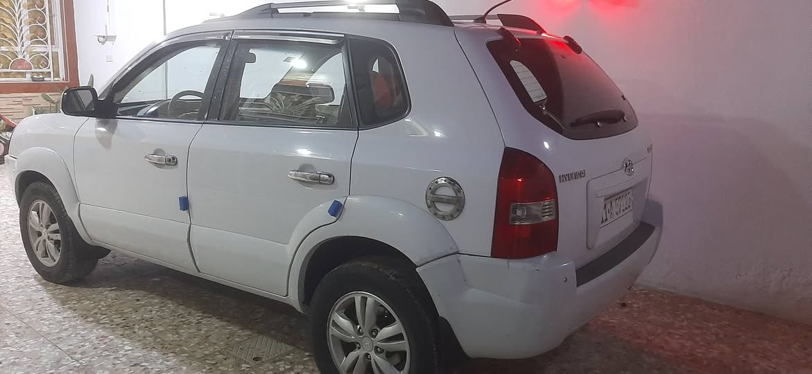 توسان خليجي ٢٠٠٩ رقم بغداد مكان سياره بابل المدحتيه *********** لسعر ١٢٧
