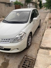 تيدا • ٢٠٠٩ • اوتوماتيك